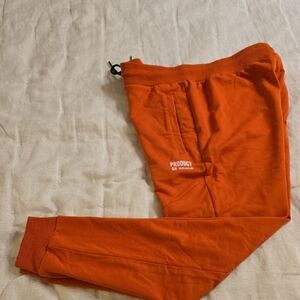 Aho Primo Joggers with Elastic Cuffs. Orange.